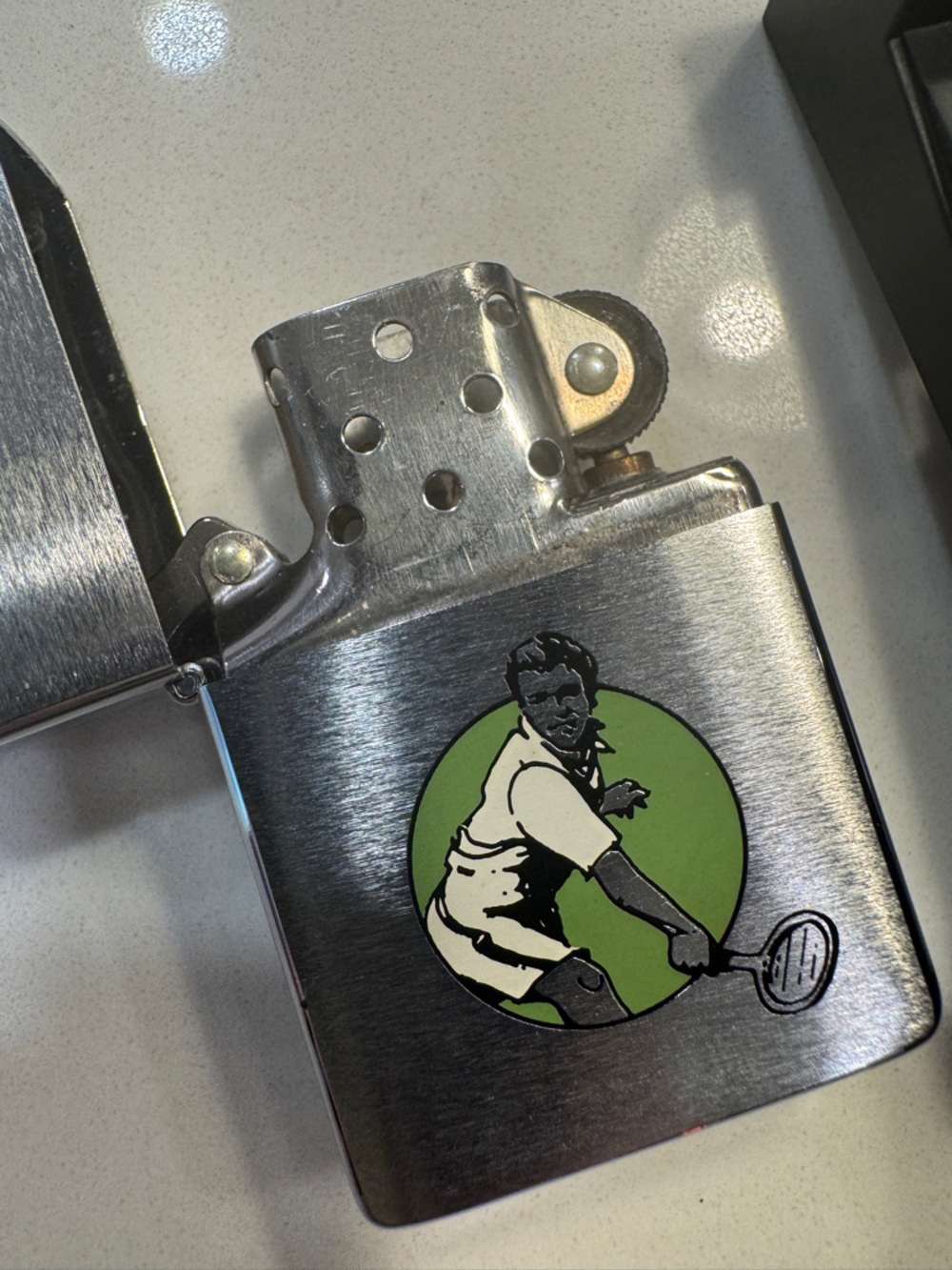 Vintage Zippo Lighter with Green Tennis Player Graphic